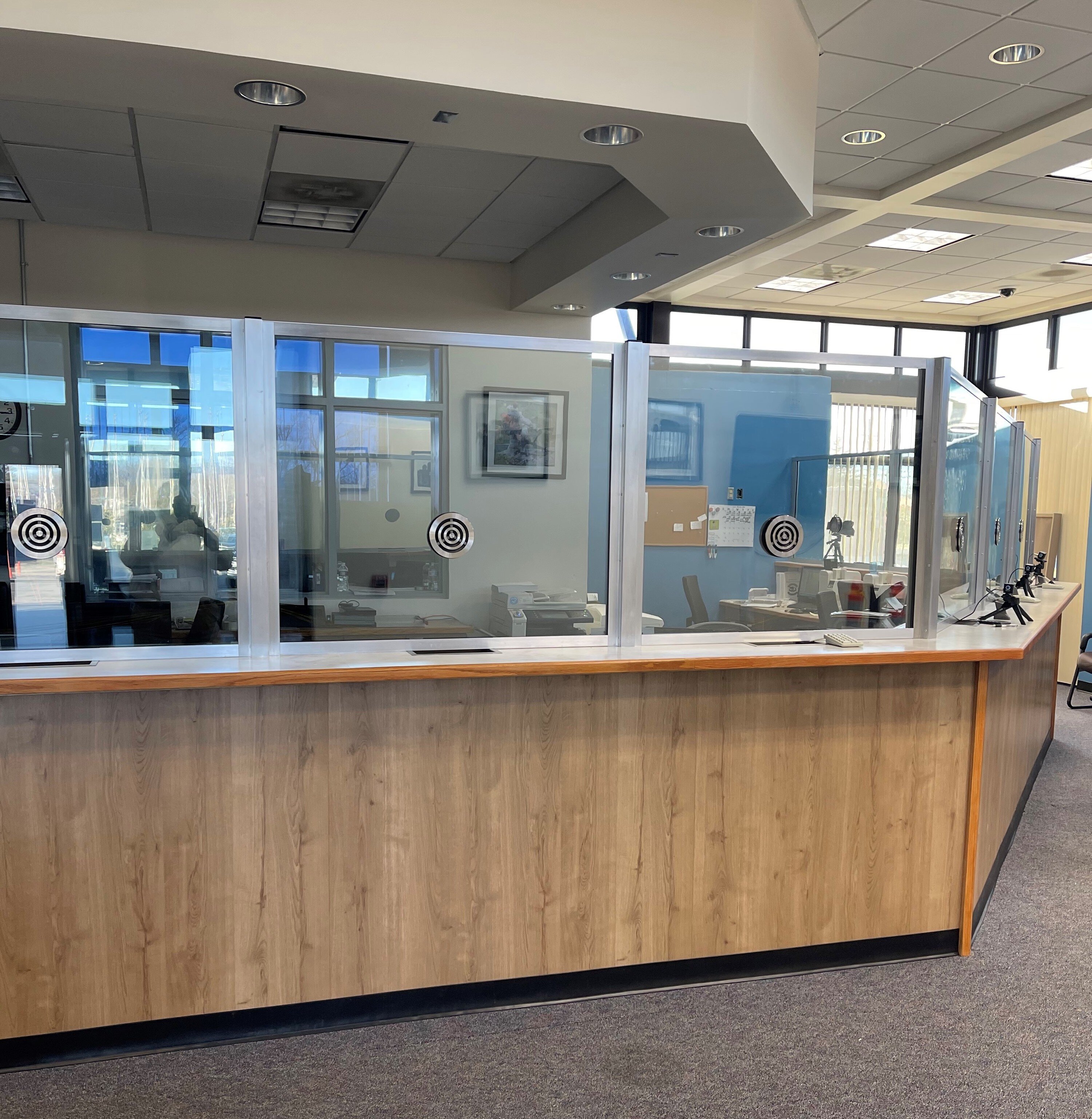 Government reception lobby with ballistic glazing and entry screening.